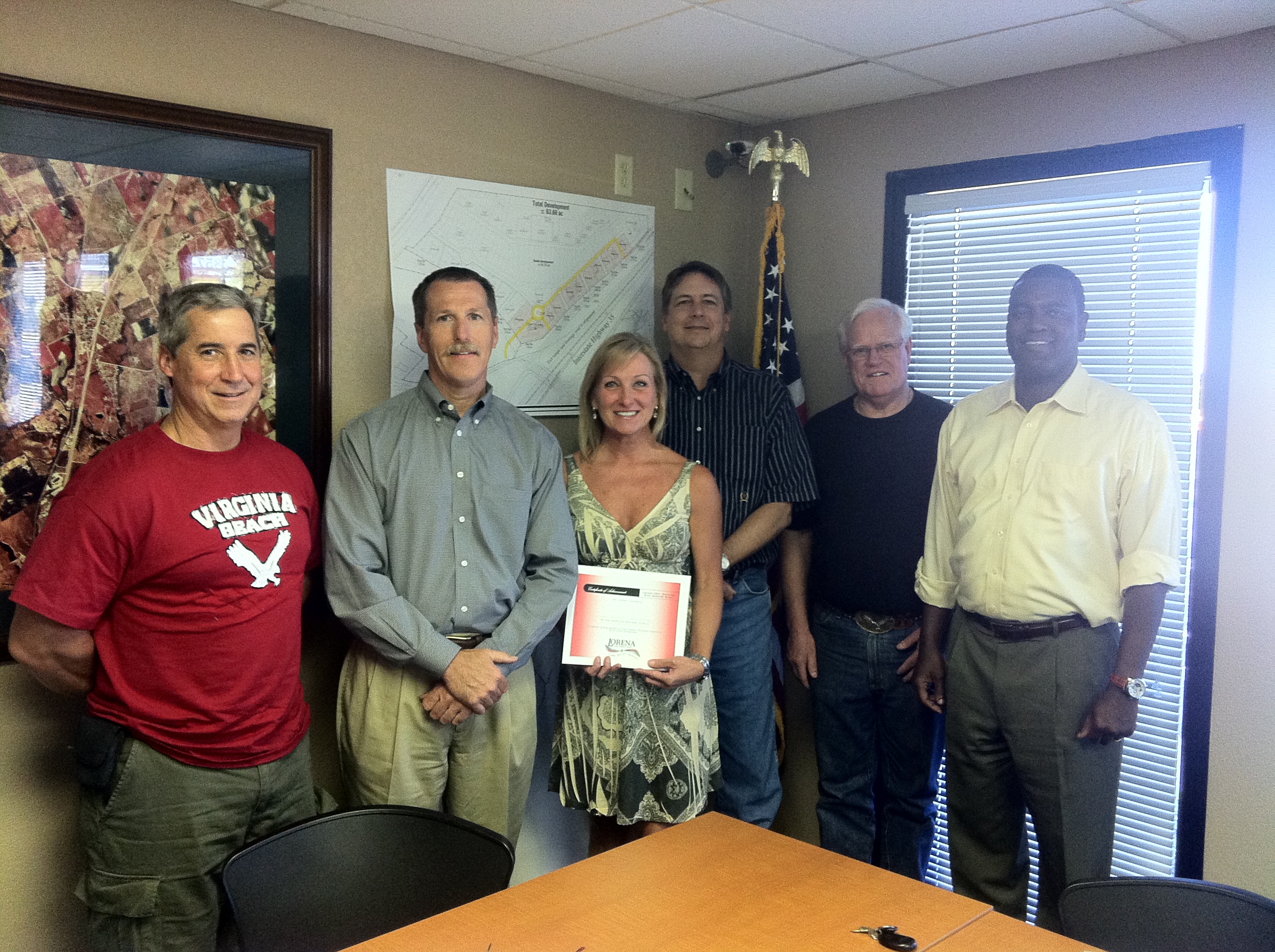 Certificate Presentation to Ta Dah Salon.JPG